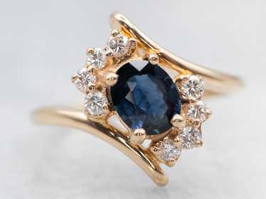 Sleek Yellow Gold Sapphire Bypass Ring with Diamo… - image 1