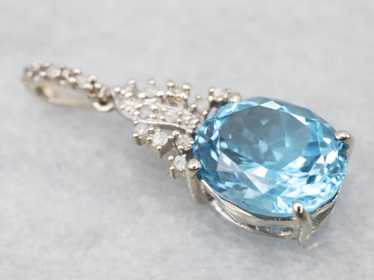 White Gold Blue Topaz and Diamond Pendant - image 1