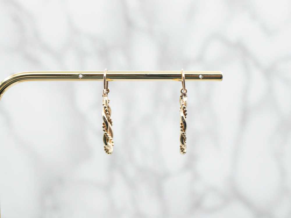 Yellow Gold Twisted Hoop Earrings - image 4