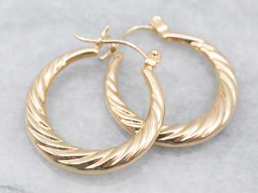 Yellow Gold Twisted Hoop Earrings - image 1