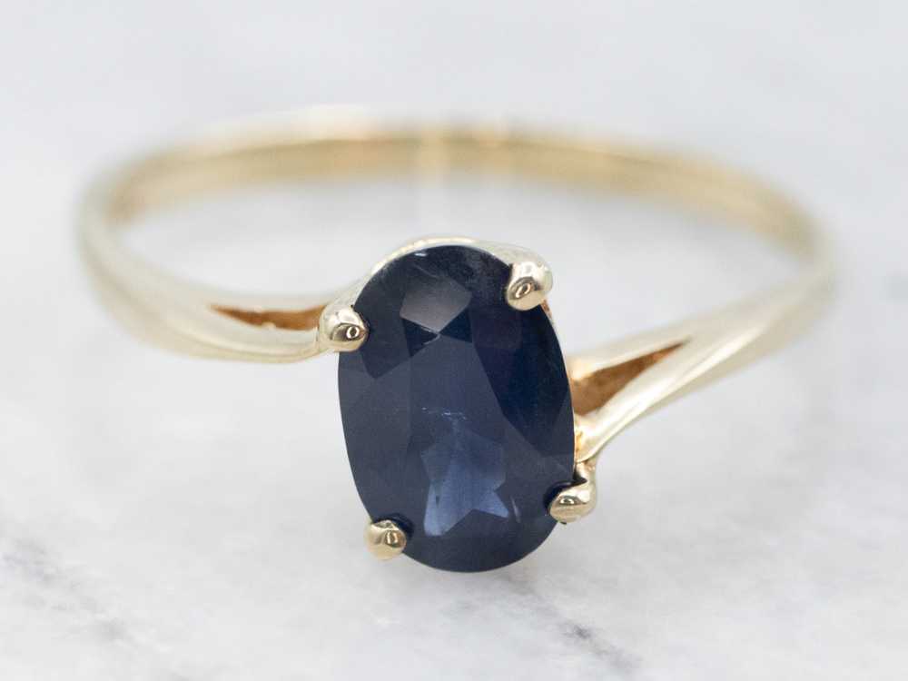 Dainty Blue Sapphire Solitaire Bypass Ring - image 1