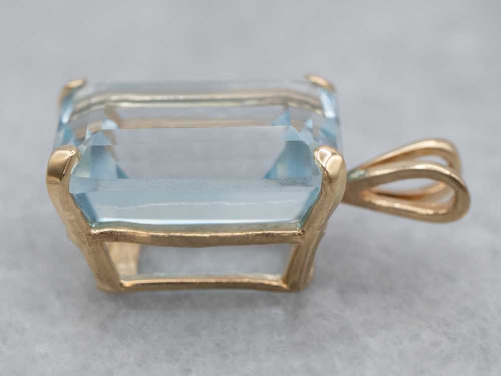 Blue Topaz Solitaire Pendant in Yellow Gold - image 2