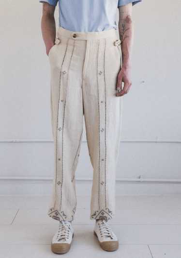 Bode emblem ladder-stitch side-tie linen trousers - image 1