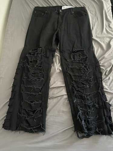 Distressed Denim Distressed & Flared Black Denim