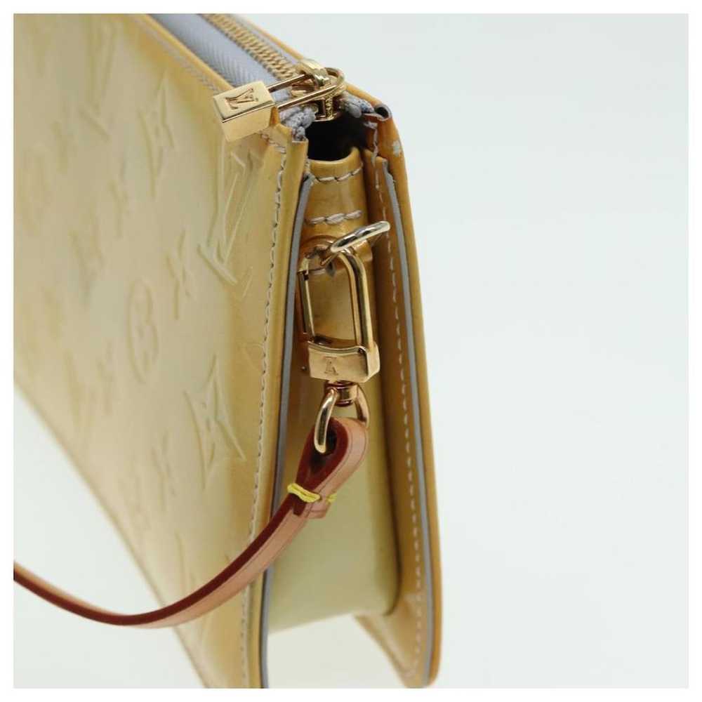 Louis Vuitton Lexington leather clutch bag - image 8