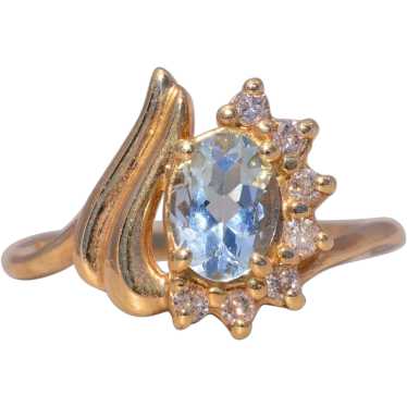 Aquamarine and Diamond Ring in 14 Karat Gold - image 1