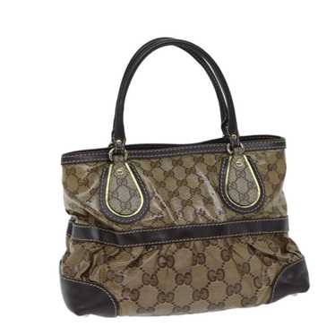 Gucci Gg Crystal Beige Canvas Handbag (Pre-Owned) - image 1