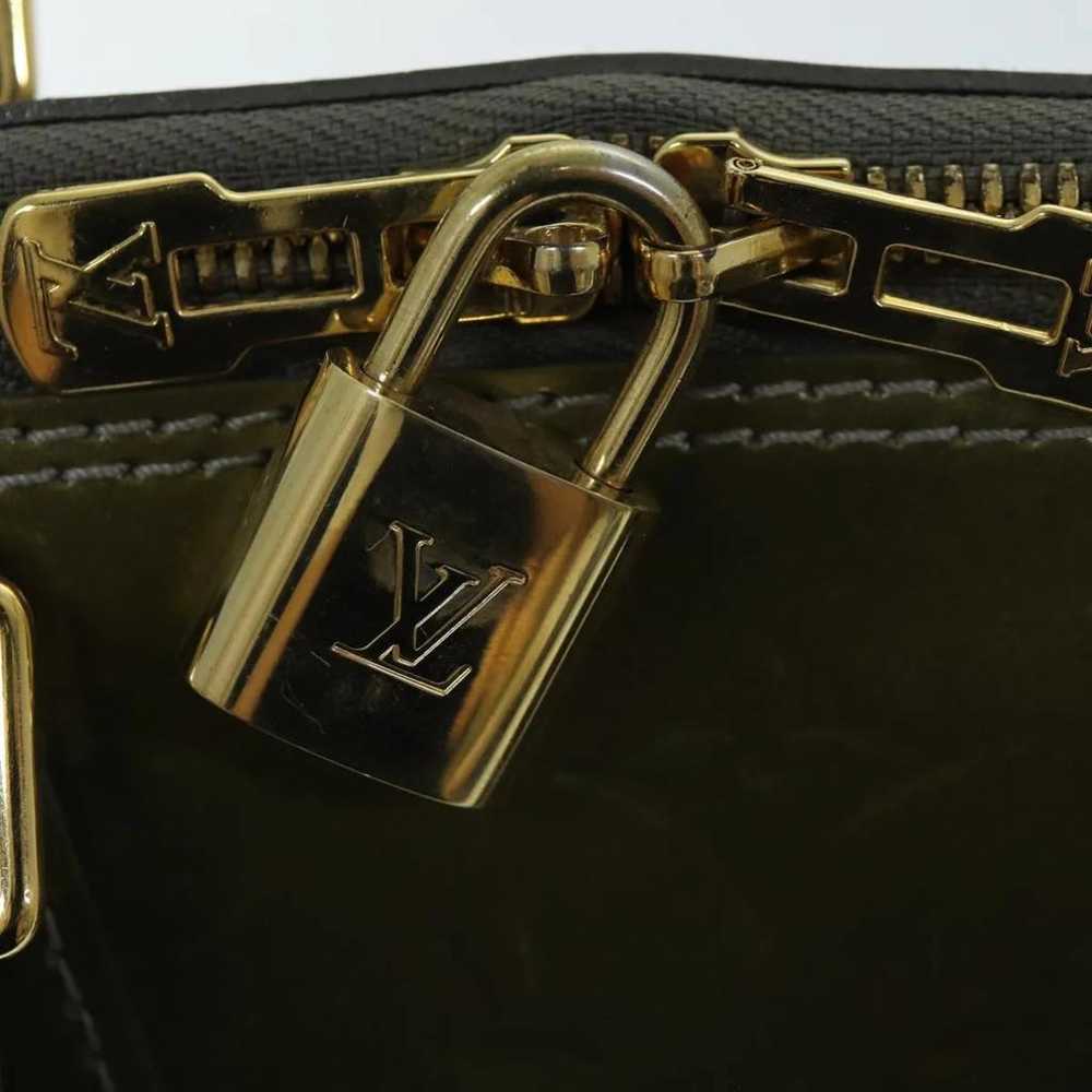 Louis Vuitton Alma patent leather handbag - image 8