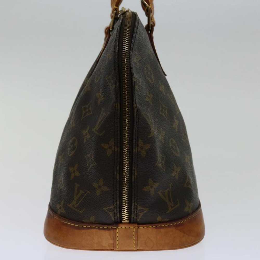 Louis Vuitton Alma cloth handbag - image 9