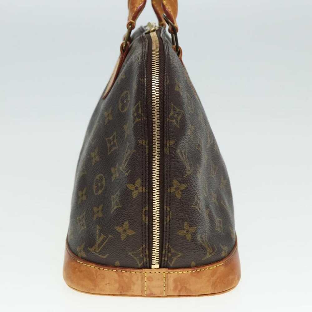 Louis Vuitton Alma cloth handbag - image 9