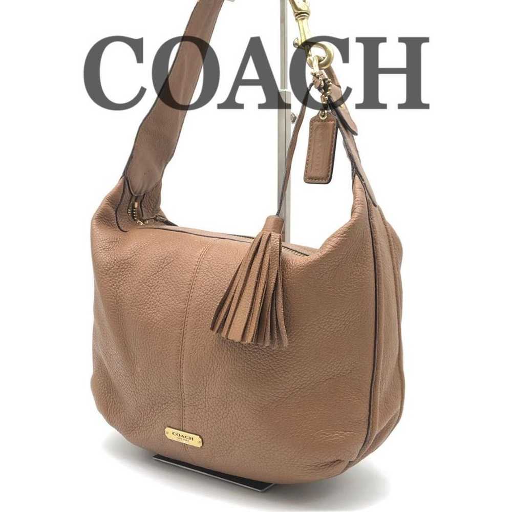 Coach one-shoulder leather bag with tassel - image 1