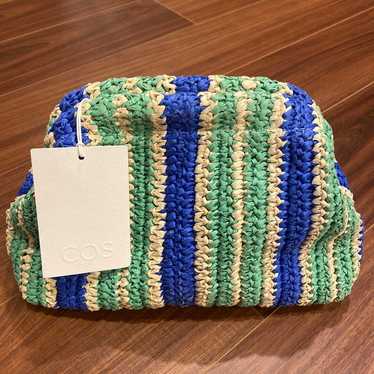 Brand new COS raffia clutch.