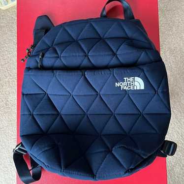 The North Face backpack navy blue.