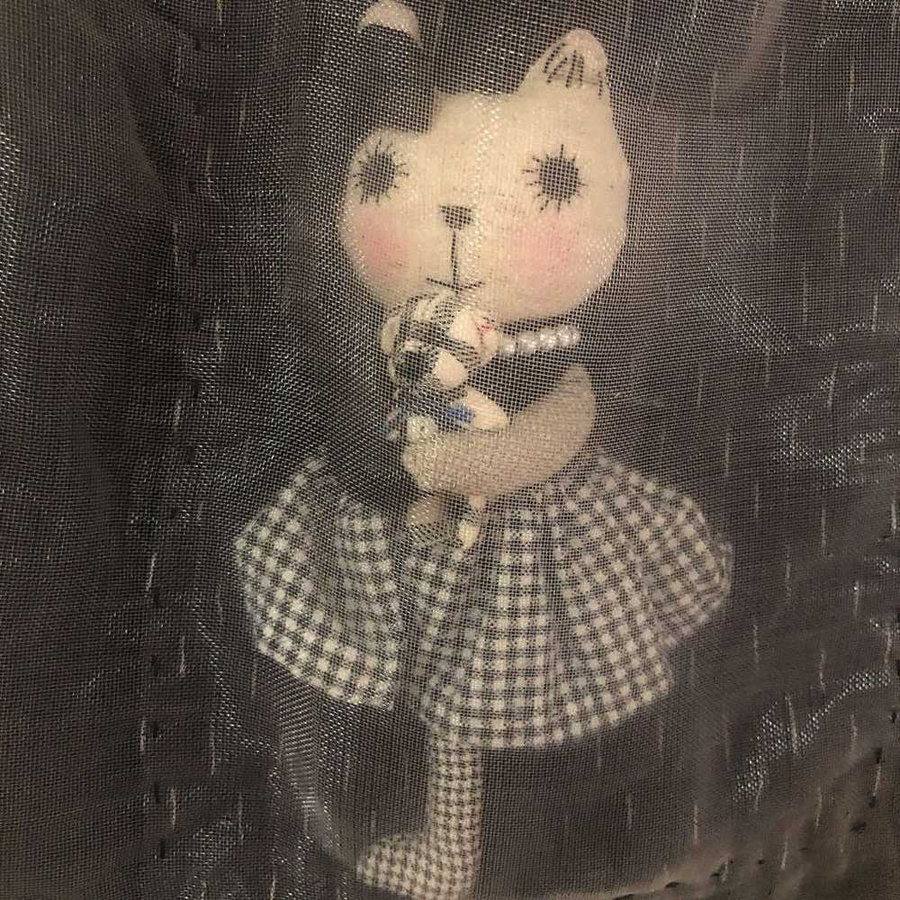 Bag with a cat doll inside - image 3