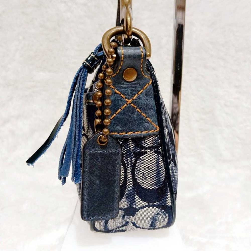 Coach pouch denim signature charm navy pouch. - image 4