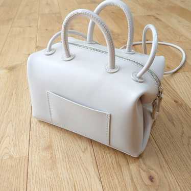 Brand new YAHKI White Leather Bag.