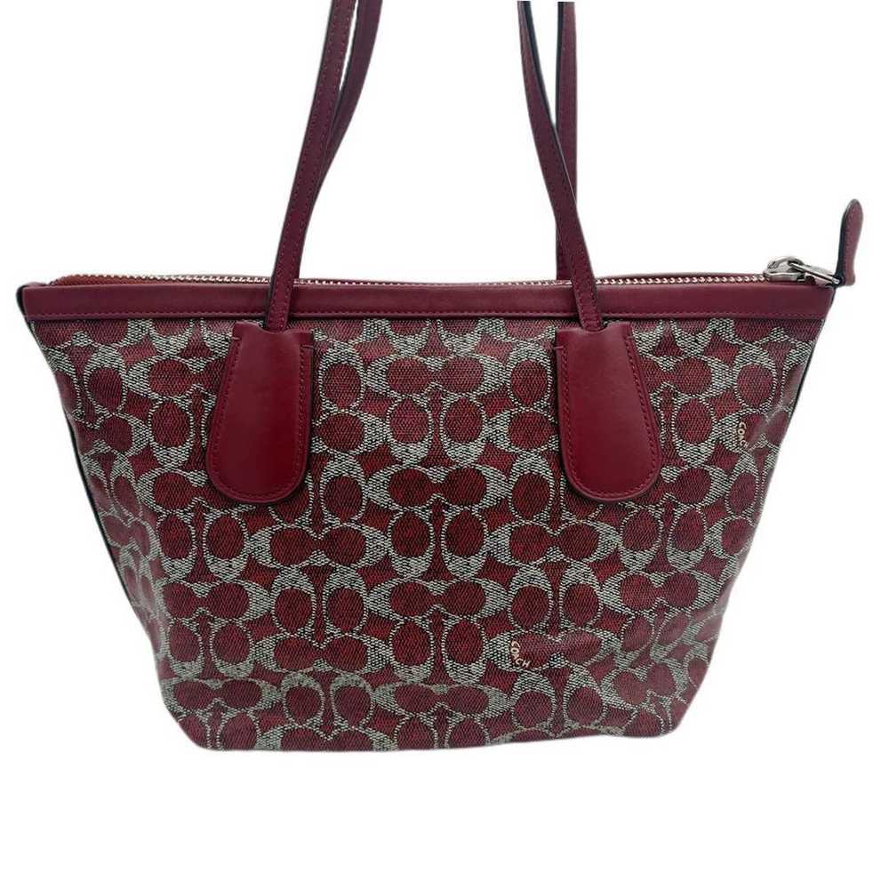 Almost unused coach taxi zip top tote bag signatu… - image 3