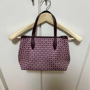 Kate Spade tote bags.