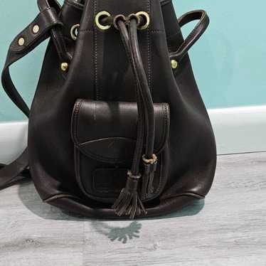 Dooney orders & Bourke Vintage black leather with hearts backpack purse