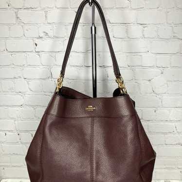 Coach Lexy Pebbled Leather Shoulder Handbag in Bro