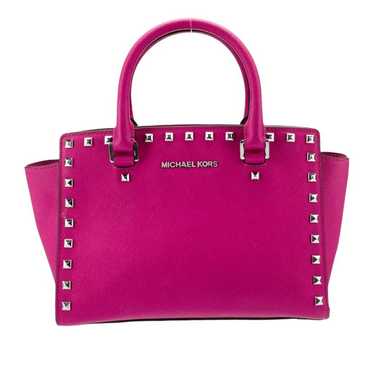 Michael Kors patent leather handbags