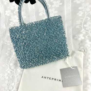 Early bird catches the worm. ANTEPRIMA handbag / P