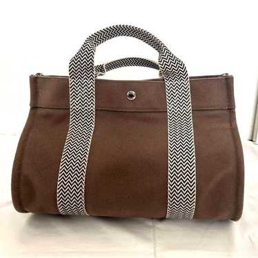 Hermes handbag Cannes PM with pouch canvas gray.