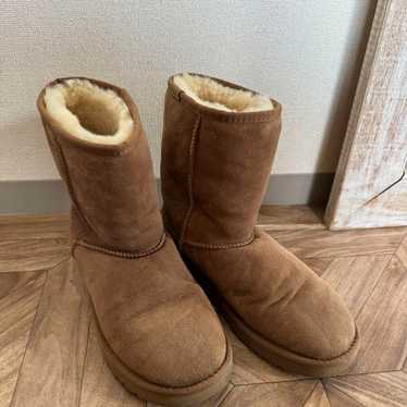 UGG sheepskin boots in brown.