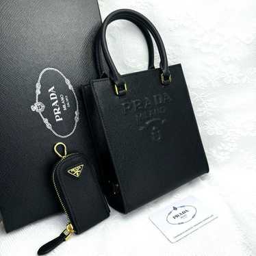 Prada shoulder bag mini bag leather bag in black.