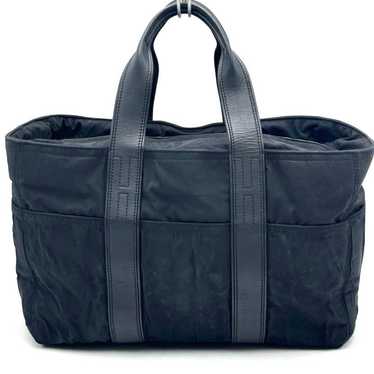 HERMES Acapulco PM tote bag in black.