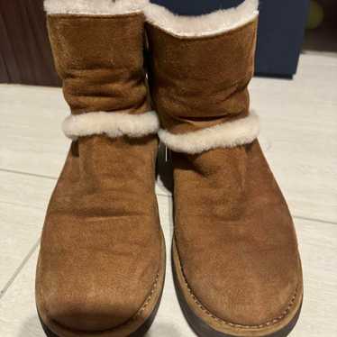 Brown suede sheepskin boots.