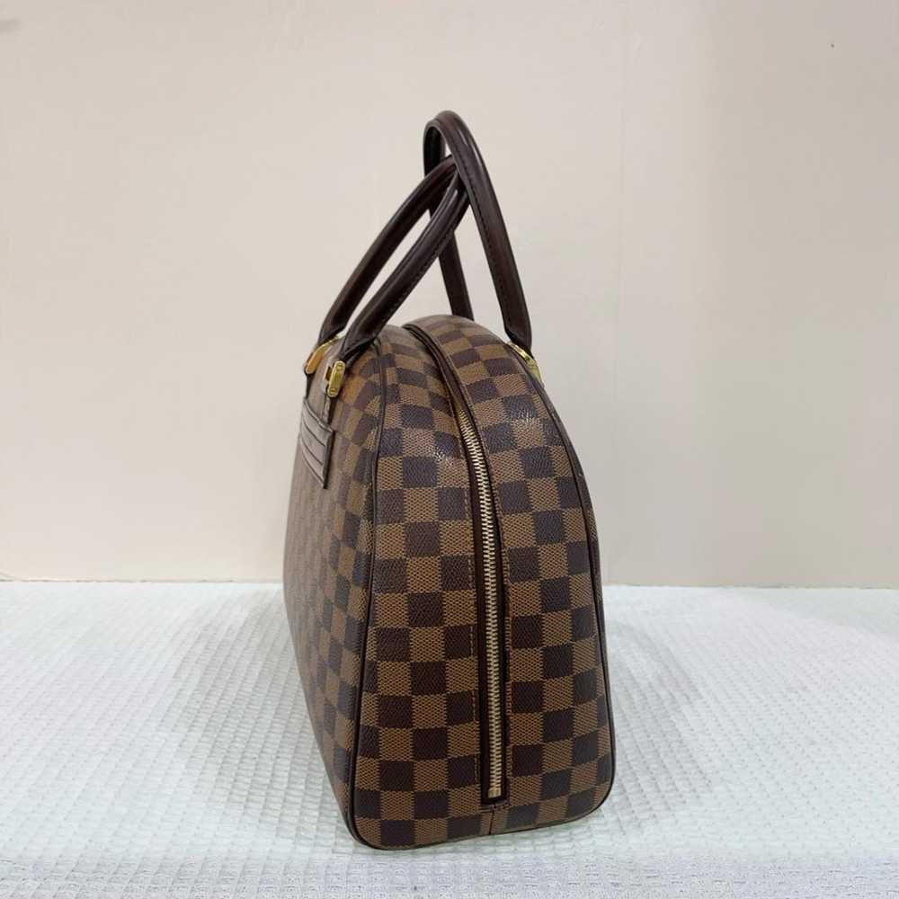 Louis Vuitton Nolita leather handbag - image 10