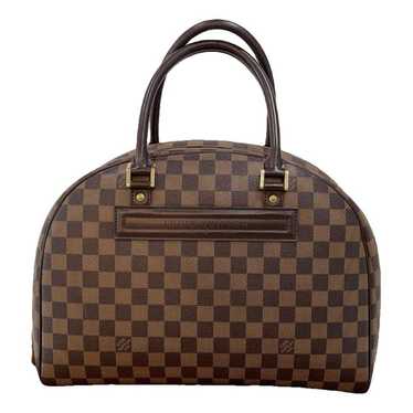 Louis Vuitton Nolita leather handbag - image 1