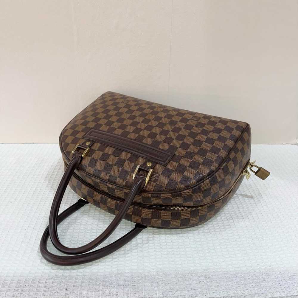 Louis Vuitton Nolita leather handbag - image 9