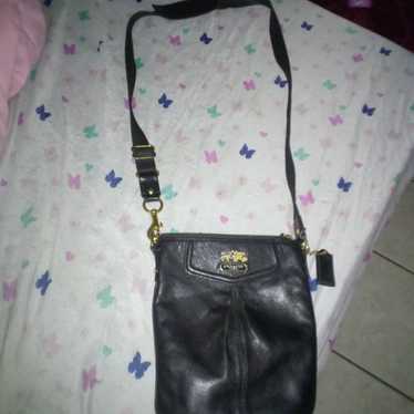 crossbodybag Coach purse.  Nice, thick black shiny