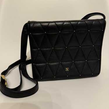 Valentino black leather quilted shoulder bag.