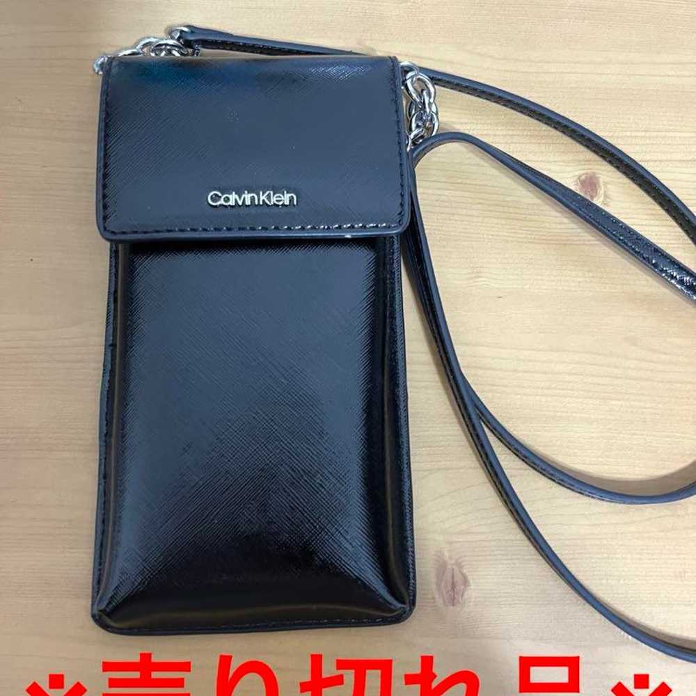 Calvin Klein black smartphone shoulder bag. - image 1