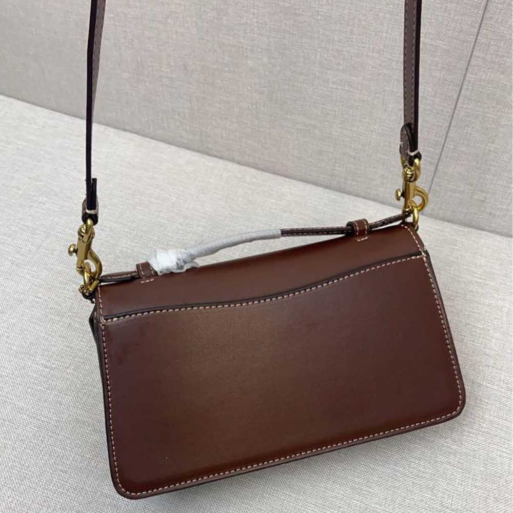 Coach shoulder bag in brown with C-tag attached. - image 2