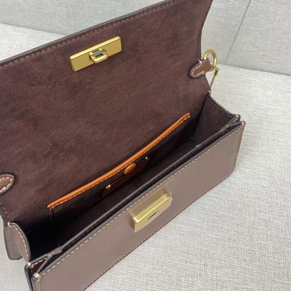 Coach shoulder bag in brown with C-tag attached. - image 7