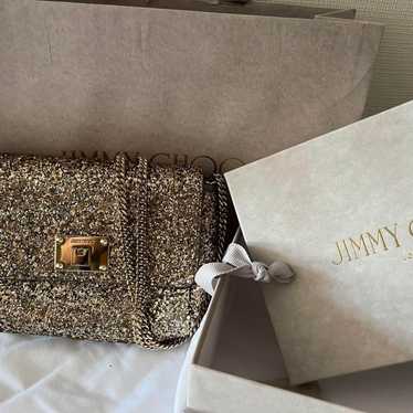 Jimmy Choo sparkly bag.