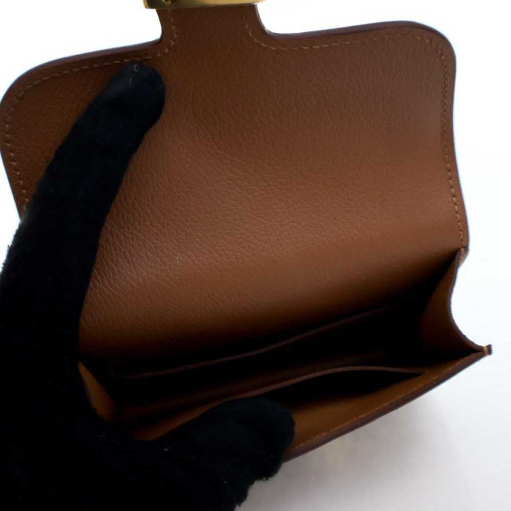 Hermès Constance leather purse - image 11