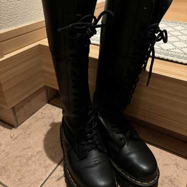 Dr. Martens black leather long boots with chunky s