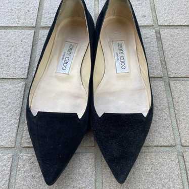 Jimmy Choo flat shoes.