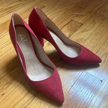 Red suede high heel pumps