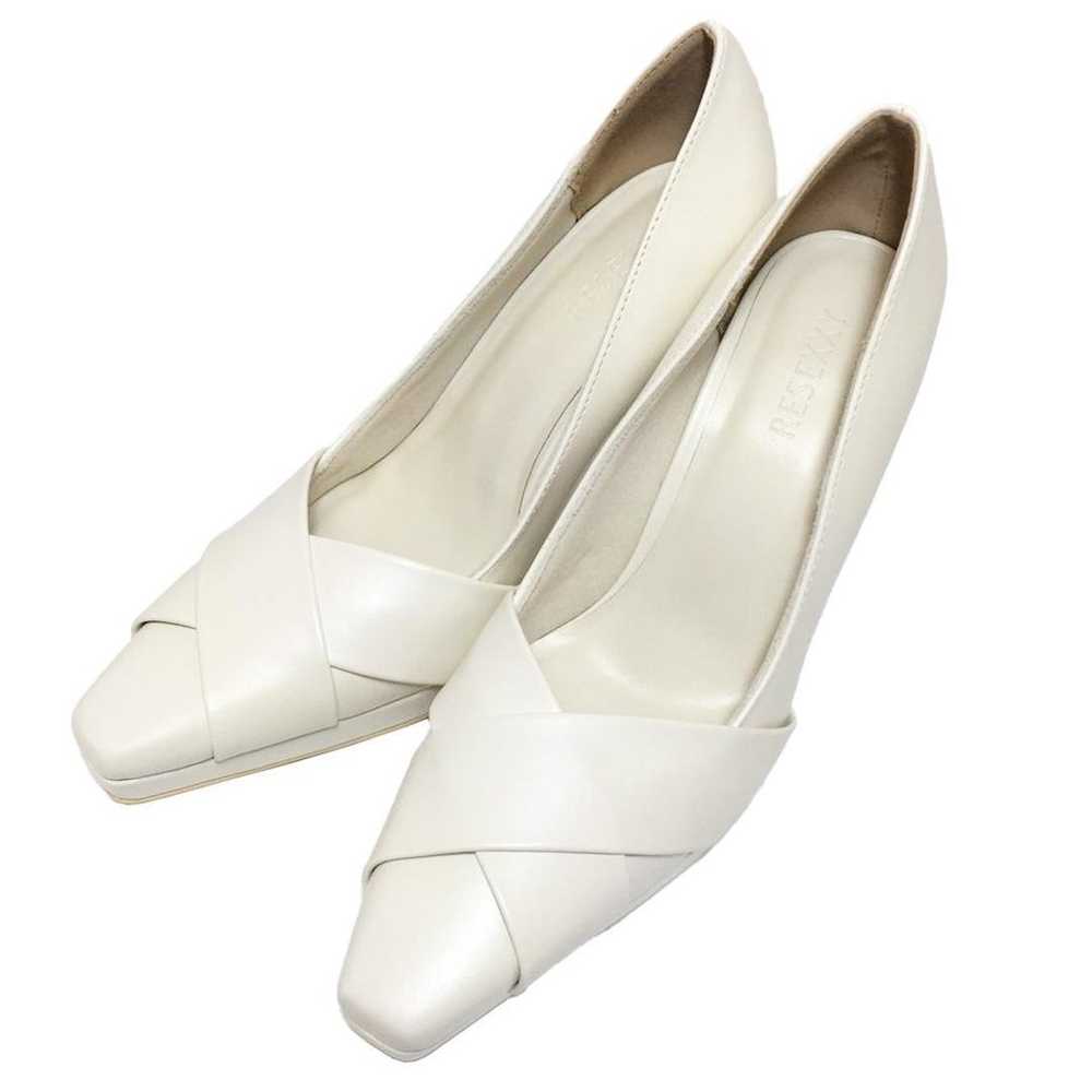 RESEXXY RIZEXY Cross Design Pumps Ivory - image 1