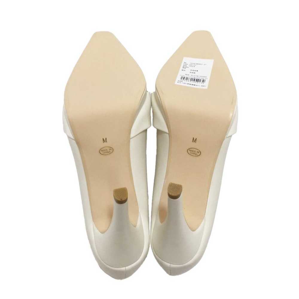 RESEXXY RIZEXY Cross Design Pumps Ivory - image 4