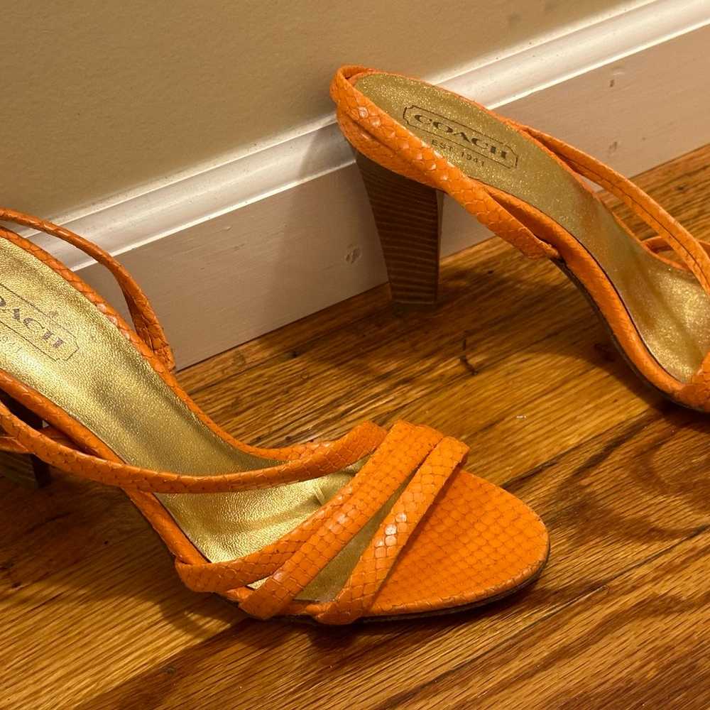 Orange heels, never worn genuine leather - image 1