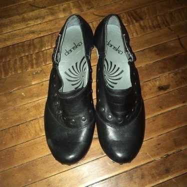 Dansko black leather clogs