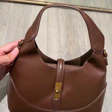 Brown leather handbag