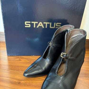 Black booties from STATUS.